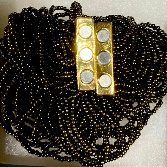 multi row brown seed bracelet with hammered gold toned metallic closure - Picture 4 of 4